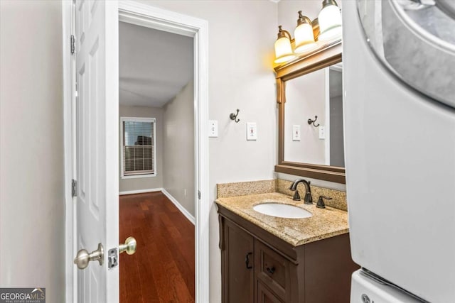 1101 Collier Rd NW Unit K2, Atlanta, GA 30318 - bedroom featuring baseboards, wood-type flooring, and a ceiling fan
