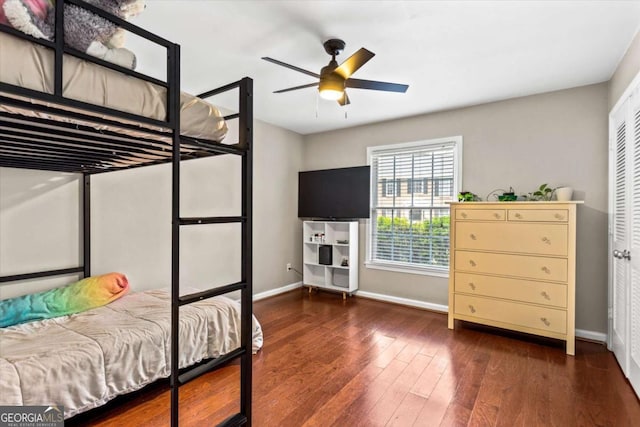 1101 Collier Rd NW Unit K2, Atlanta, GA 30318 - bedroom with baseboards, wood finished floors, and a ceiling fan