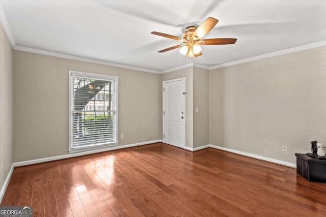 1101 Collier Rd NW Unit K2, Atlanta, GA 30318 - unfurnished room with a ceiling fan, ornamental molding, baseboards, and wood finished floors
