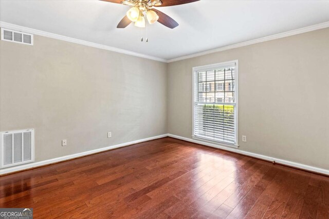 1101 Collier Rd NW Unit K2, Atlanta, GA 30318 - unfurnished room featuring a ceiling fan, wood finished floors, ornamental molding, and baseboards