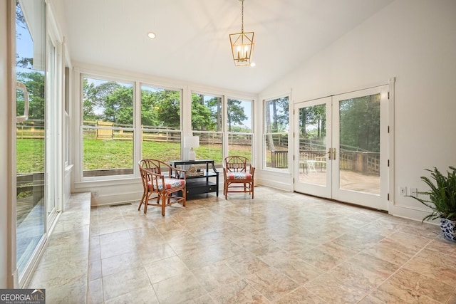 10310 Amberside Ct, Roswell, GA 30076 - sunroom / solarium featuring french doors, a chandelier, lofted ceiling, and baseboards