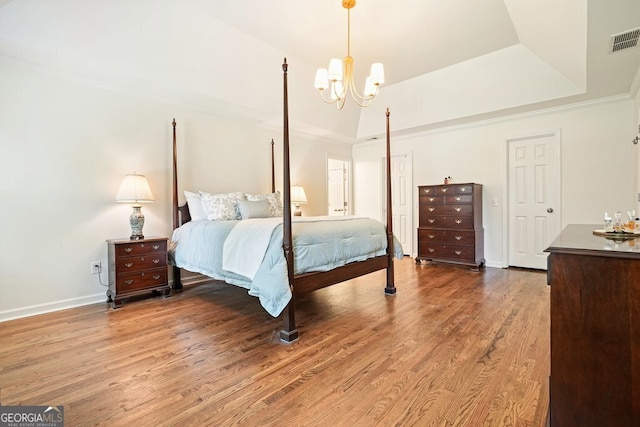 10310 Amberside Ct, Roswell, GA 30076 - bedroom with a chandelier, wood finished floors, baseboards, a tray ceiling, and ornamental molding