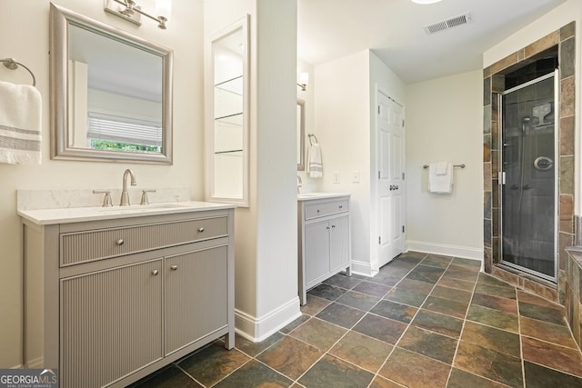 10310 Amberside Ct, Roswell, GA 30076 - full bath featuring a shower stall, two vanities, baseboards, and stone tile flooring