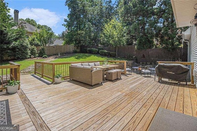 wooden deck featuring outdoor lounge area