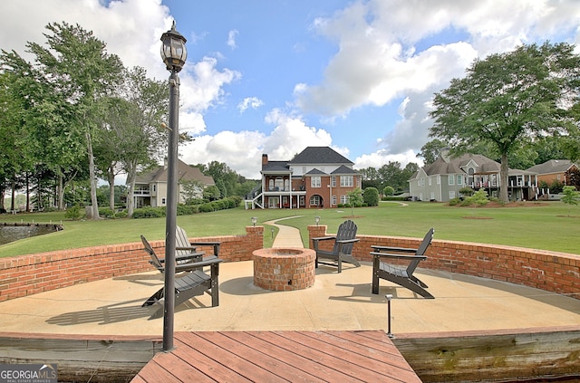 150 Bay Dr, Newnan, GA 30263 - view of patio / terrace featuring a fire pit, a deck with water view, and a residential view