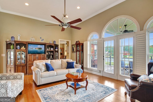 150 Bay Dr, Newnan, GA 30263 - living area featuring a ceiling fan, wood finished floors, recessed lighting, and crown molding