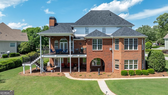 150 Bay Dr, Newnan, GA 30263 - rear view of property featuring a lawn, a chimney, a patio, brick siding, and a deck