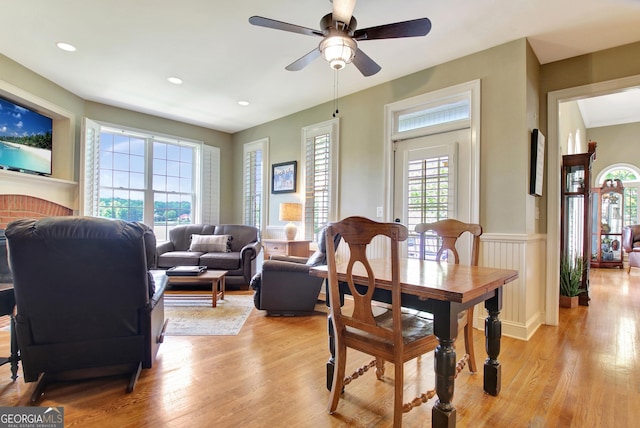 150 Bay Dr, Newnan, GA 30263 - dining area with light wood-style floors, a ceiling fan, wainscoting, and recessed lighting