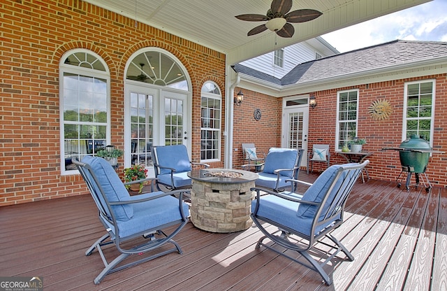 150 Bay Dr, Newnan, GA 30263 - deck with a fire pit, ceiling fan, and area for grilling