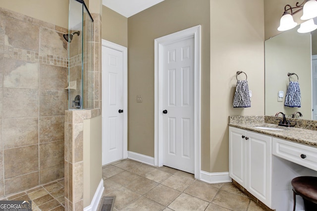 150 Bay Dr, Newnan, GA 30263 - bathroom featuring walk in shower, vanity, and baseboards