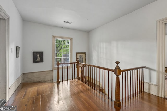 171 N Jefferson Ave, Talbotton, GA 31827 - corridor featuring hardwood / wood-style floors and an upstairs landing