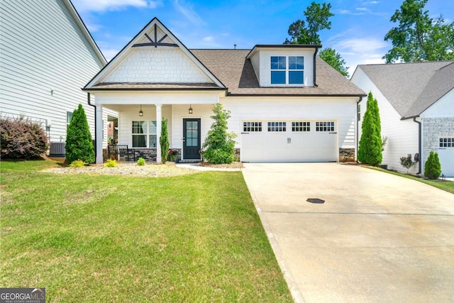 75 Georgian Oaks Ct, Newnan, GA 30265 - view of front of property featuring a front yard, covered porch, driveway, and central AC unit