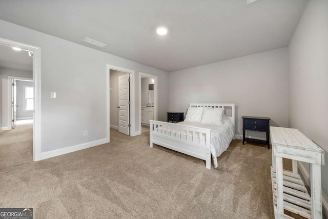 75 Georgian Oaks Ct, Newnan, GA 30265 - carpeted bedroom with baseboards and connected bathroom