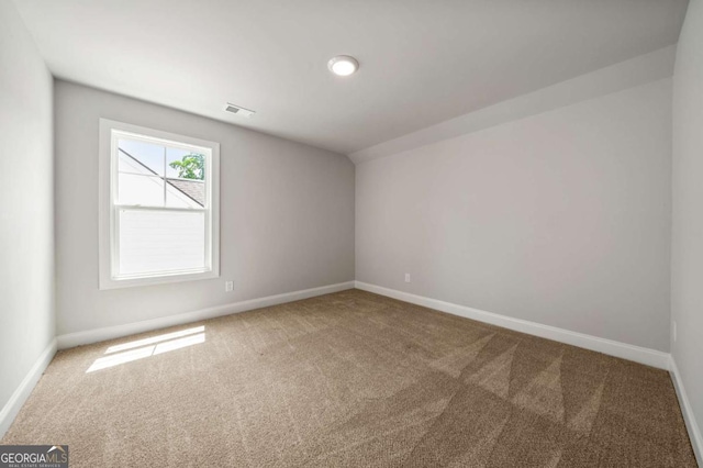 75 Georgian Oaks Ct, Newnan, GA 30265 - carpeted empty room with baseboards