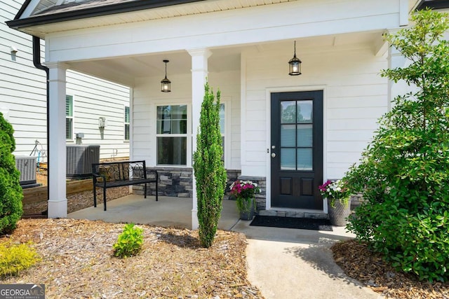 75 Georgian Oaks Ct, Newnan, GA 30265 - entrance to property with a porch and cooling unit