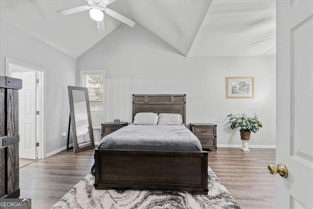 613 Wiley Ct, Canton, GA 30115 - bedroom with wood finished floors, a ceiling fan, and high vaulted ceiling