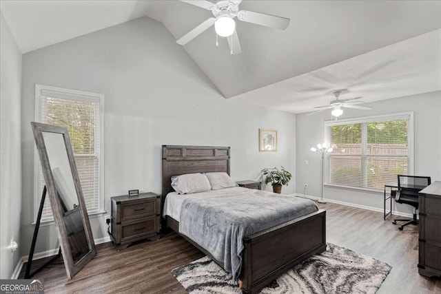 613 Wiley Ct, Canton, GA 30115 - bedroom featuring vaulted ceiling, dark wood-style flooring, and a ceiling fan