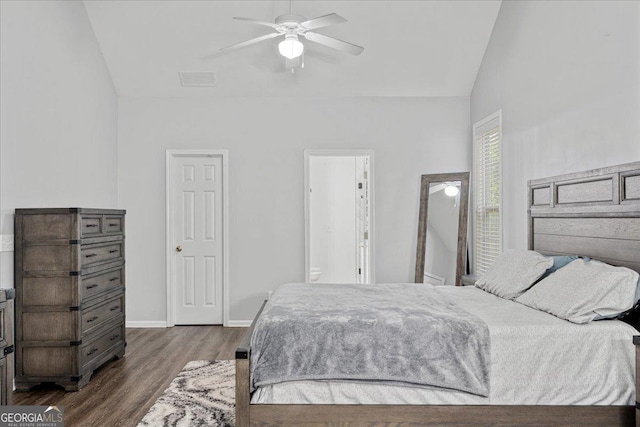 613 Wiley Ct, Canton, GA 30115 - bedroom featuring dark wood-style flooring, lofted ceiling, a ceiling fan, and ensuite bath