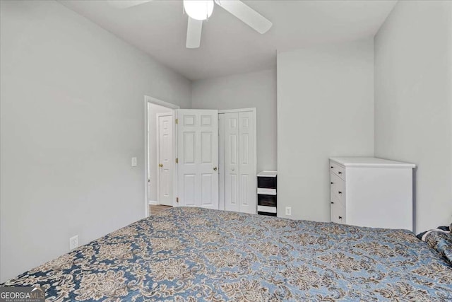 613 Wiley Ct, Canton, GA 30115 - bedroom featuring a ceiling fan and a closet