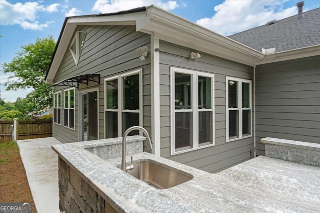 613 Wiley Ct, Canton, GA 30115 - view of side of property with a sink