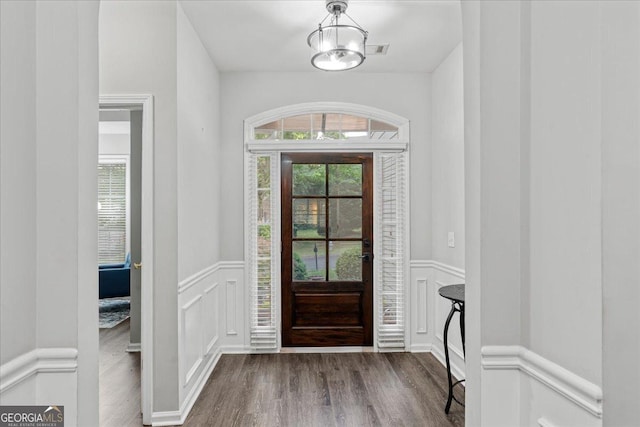 613 Wiley Ct, Canton, GA 30115 - foyer with a decorative wall, dark wood finished floors, and a wainscoted wall