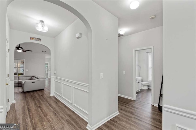 613 Wiley Ct, Canton, GA 30115 - hall featuring arched walkways and wood finished floors