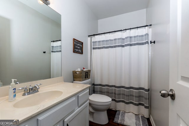 full bathroom featuring vanity, wood finished floors, toilet, and a shower with shower curtain