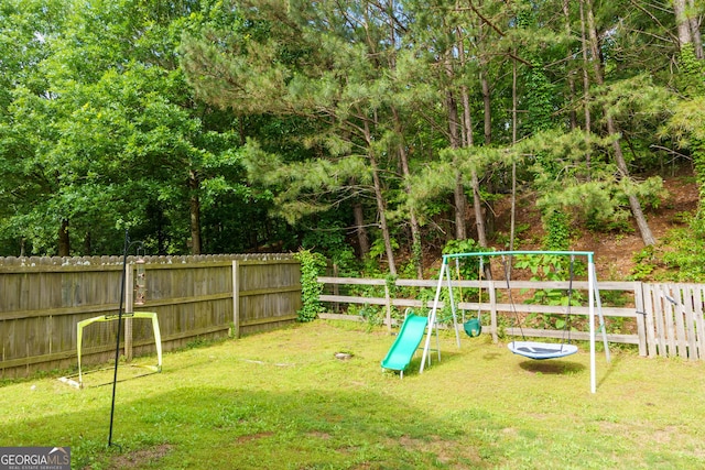 view of yard featuring a playground