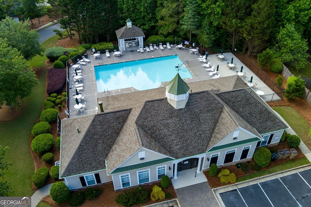 view from above of property featuring a pool area