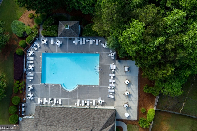 drone / aerial view of a pool area