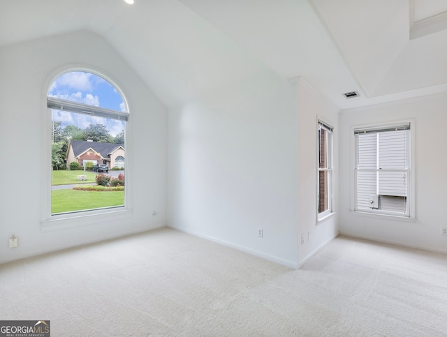 2910 Waverly Place Dr, Dacula, GA 30019 - spare room featuring carpet flooring and lofted ceiling