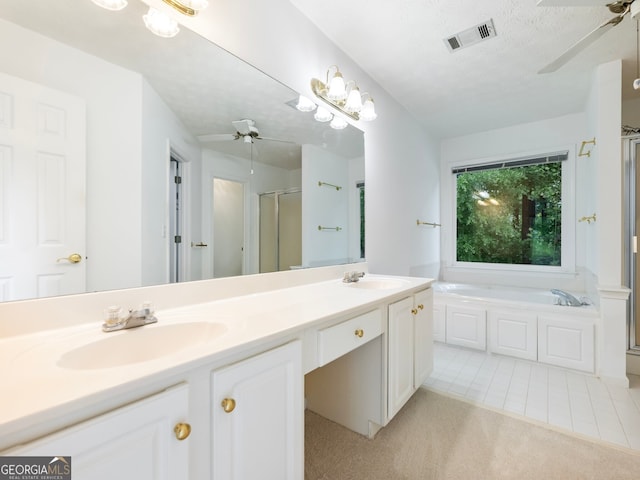 2910 Waverly Place Dr, Dacula, GA 30019 - full bath featuring a ceiling fan, double vanity, a shower stall, and a bath