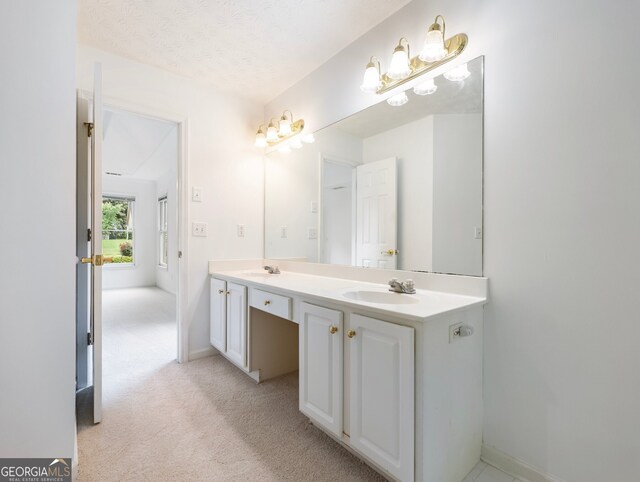 2910 Waverly Place Dr, Dacula, GA 30019 - bathroom featuring double vanity and baseboards