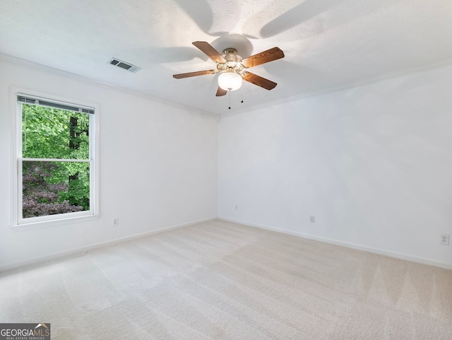 2910 Waverly Place Dr, Dacula, GA 30019 - empty room with light colored carpet, ornamental molding, a ceiling fan, and baseboards