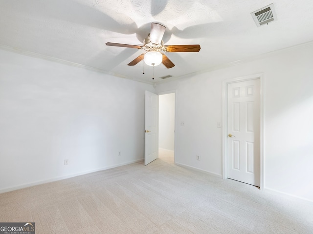 2910 Waverly Place Dr, Dacula, GA 30019 - unfurnished bedroom featuring light colored carpet, crown molding, baseboards, and ceiling fan