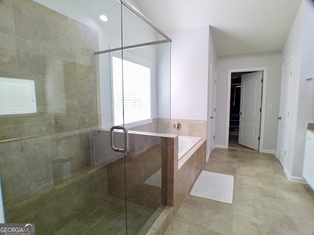 3943 Ridge Grove Way, Suwanee, GA 30024 - bathroom with a garden tub, a stall shower, and tile patterned flooring