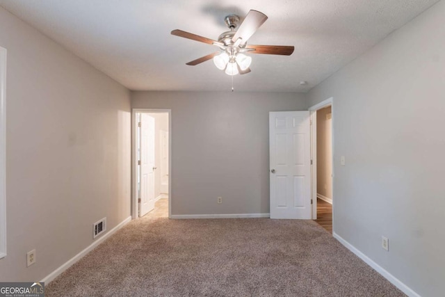 6015 Sumit Ct NW, Kennesaw, GA 30152 - empty room with carpet flooring, a ceiling fan, and baseboards