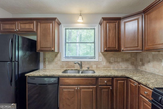 6015 Sumit Ct NW, Kennesaw, GA 30152 - kitchen featuring black appliances, a sink, decorative backsplash, light stone countertops, and a textured ceiling