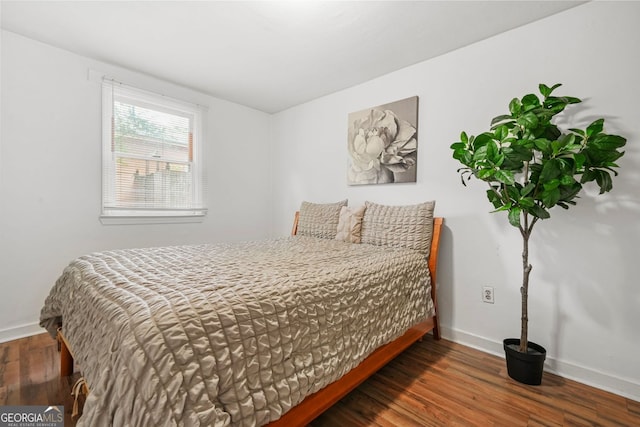 210 Estoria St SE, Atlanta, GA 30316 - bedroom featuring baseboards and wood finished floors