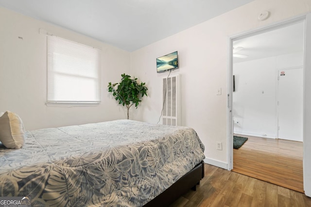210 Estoria St SE, Atlanta, GA 30316 - bedroom featuring wood finished floors and baseboards