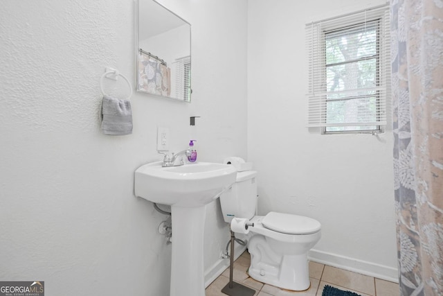 210 Estoria St SE, Atlanta, GA 30316 - bathroom with tile patterned flooring and curtained shower