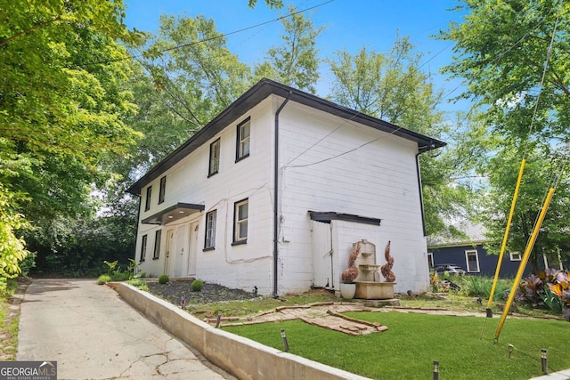 210 Estoria St SE, Atlanta, GA 30316 - view of home's exterior with a lawn
