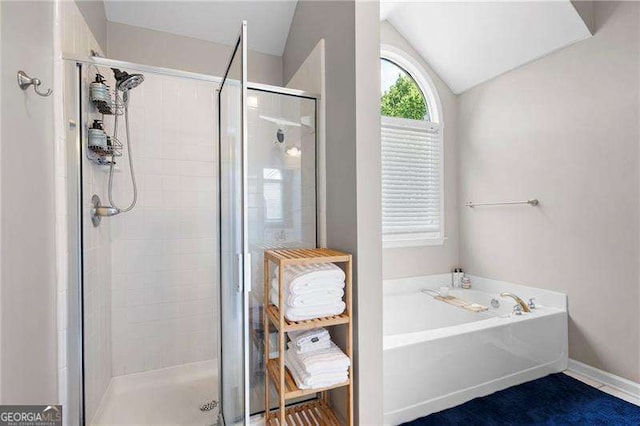 101 Misty Valley Dr, Canton, GA 30114 - bathroom with a shower stall, vaulted ceiling, and a garden tub