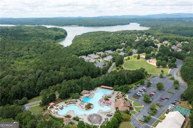 101 Misty Valley Dr, Canton, GA 30114 - view of property location featuring a heavily wooded area, a nearby body of water, and a pool area