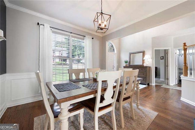 101 Misty Valley Dr, Canton, GA 30114 - dining room featuring a chandelier, dark wood-style floors, ornamental molding, and wainscoting