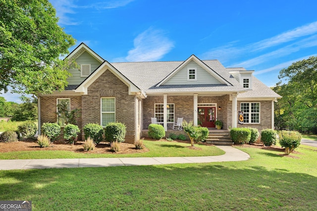 85 Majestic Shores Trl, Hartwell, GA 30643 - view of front of house with a porch, a front lawn, and brick siding