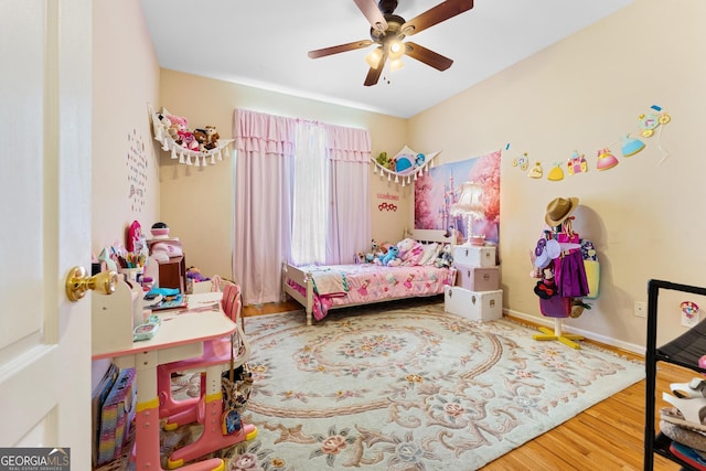 85 Majestic Shores Trl, Hartwell, GA 30643 - bedroom featuring wood finished floors, ceiling fan, and baseboards