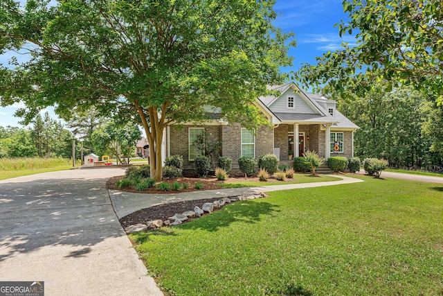 85 Majestic Shores Trl, Hartwell, GA 30643 - view of front of property featuring brick siding, a front yard, and a porch