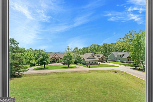 85 Majestic Shores Trl, Hartwell, GA 30643 - view of green lawn featuring a residential view and driveway
