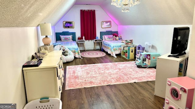 34 Pine Grove Rd, Cartersville, GA 30120 - bedroom with wood finished floors, lofted ceiling, and a textured ceiling